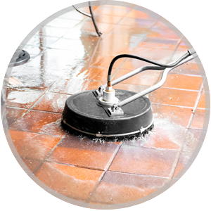 Tile and grout cleaning machine in action, spraying water on tiled surface, showcasing professional cleaning services by Sunny Carpet Cleaning.
